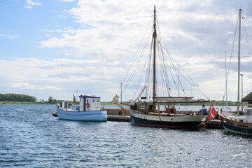 Fototapeta na wymiar Part of Ebeltoft port with old fishing boats