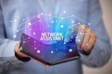 Businessman holding a foldable smartphone, new technology concept