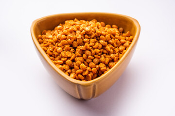 Fried and Spicy Chana Dal Masala namkeen is a popular Chakna recipe. served in a bowl