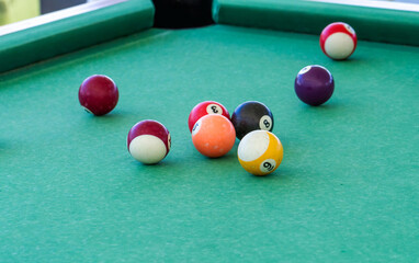 Group of colorful balls on the pool table