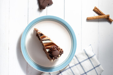 Delicious chocolate cake with fluffy cocoa sponge and marble effect icing