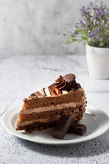 Delicious chocolate cake with fluffy cocoa sponge and marble effect icing