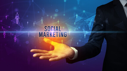 Hand holding social media related inscription