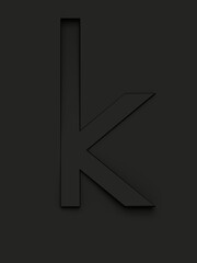 Small letter k cut from black background and rotated diagonally, 3d rendering