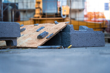 Construction site.  Workers.  House renovation with tools.  New house with new materials, stairs, sheets and house coat. Steel and iron. Tubes