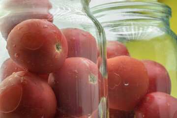 Cooking pickled tomatoes in a jar