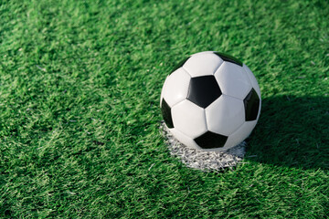 football player set ball football on grass at freekick point before shoot or kick to win a score in World Cup international league football match