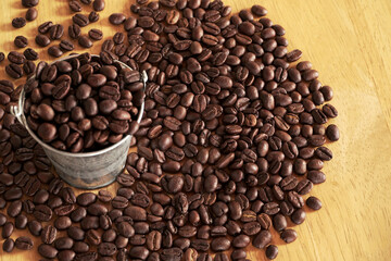 coffee beans on wood table. coffee seed