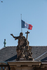 french flag on the roof of the house