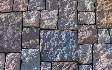 Porphyry floor texture. Architectural detail, closeup. Trentino porphyry detail useful as a background. Trentino Alto Adige, northern Italy