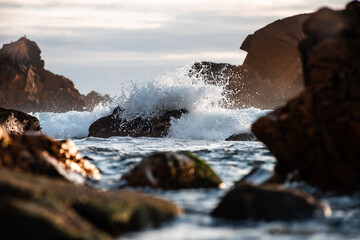 The waves brake on the rocks of Praia Da Ursa, on the western coast of Portugal