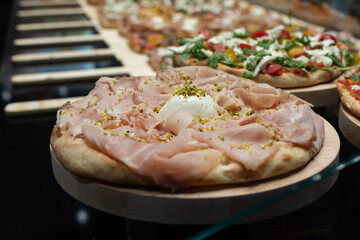 Italian Pizza Stuffed with Fresh Ham, Cheese and Pistachio Nuts