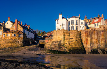 Looking at the village of Robin Hoods Bay from the beach at low tide. This is the end of the famous Coast-to-Coast walk.
