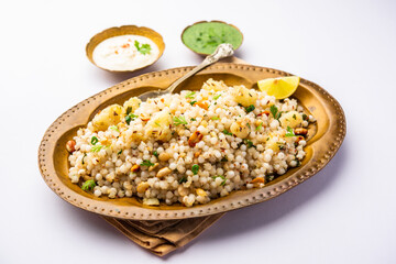 Sabudana Khichadi - An authentic dish from Maharashtra made with sago seeds, served with curd - obrazy, fototapety, plakaty