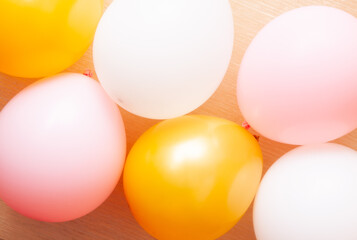 Colorful pink, gold and white air balloons as a background, beautiful design element