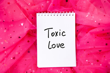 Toxic love - card with lettering on pink background, abuse relationship and feelings concept
