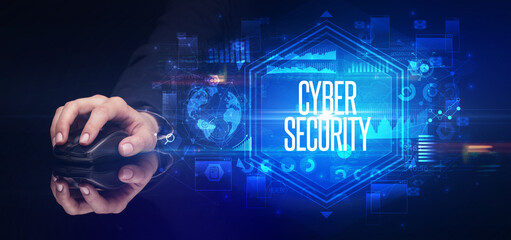 hand holding wireless peripheral, cyber security concept