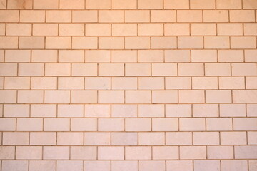 Obraz premium yellow Brick wall background. Stone wall background.