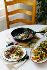 homemade family dinner of roasted squash  and chicken