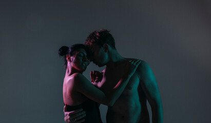 Sexy couple. Kissing couple love. Romantic lovers. Love photo. Sensual. Erotic. Shadow. Studio...