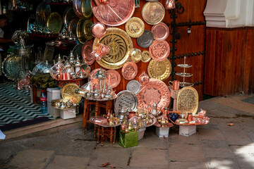 Handmade copper products outside a Bazaar in the old medina of Fez