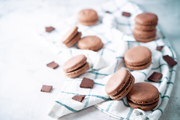Sweet chocolate macarons with chocolate cream filling