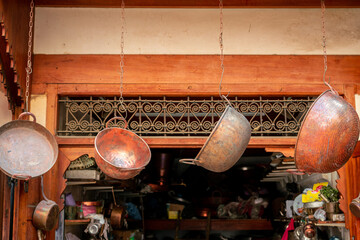 Handmade copper products outside a Bazaar in the old medina of Fez