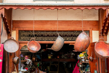Handmade copper products outside a Bazaar in the old medina of Fez