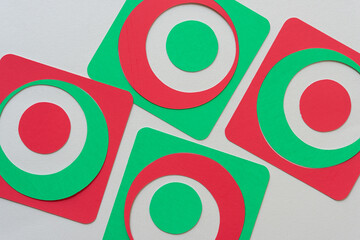 green and red paper frames with circles