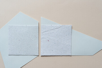 two paper tiles on paper tiles