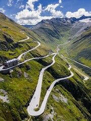 Drone shot of Swiss Mountain Roads, The Furka Pass and Susten Pass next to the Rhone Glacier