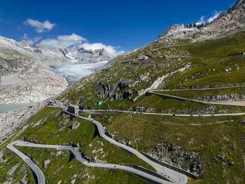 Drone shot of Swiss Mountain Roads, The Furka Pass and Susten Pass next to the Rhone Glacier