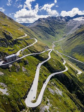 Fototapeta Drone shot of Swiss Mountain Roads, The Furka Pass and Susten Pass next to the Rhone Glacier