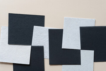 textured paper tiles on blank paper