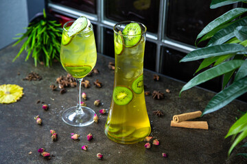 homemade lemonade made from fresh fruit. Refreshing lemonade of kiwi sliced into circles. Summer...