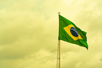 Brazilian flag flying on an iron bar - Powered by Adobe
