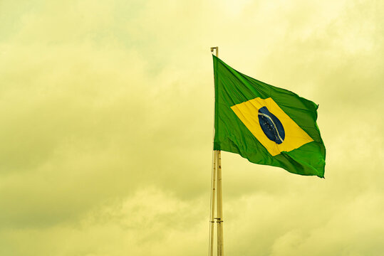 Brazilian flag flying on an iron bar - Powered by Adobe
