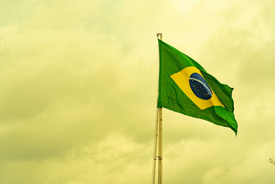 Brazilian flag flying on an iron bar - Powered by Adobe