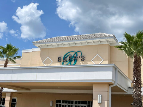 Sign on strip mall building for Baer's furniture brand of designer home furnishings warehouse center store in Florida