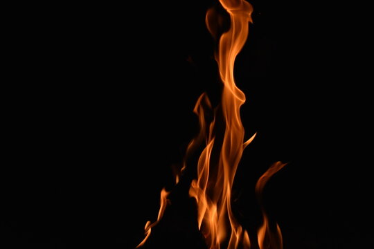 Flames from a Campfire in the Dark Night