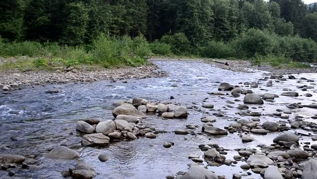 Mountain river, shooting in the evening. Stones and