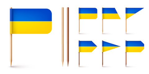 Realistic various Ukrainian toothpick flags. Souvenir from Ukraine. Wooden toothpicks with paper flag. Location mark, map pointer. Blank mockup for advertising and promotions. Vector illustration