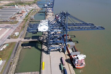 defLondon Thamesport,Container port river Medway Kent UK drone aerial view. - obrazy, fototapety, plakaty