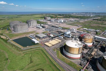 National grid Grain LNG Terminal gas storage Kent UK drone aerial view