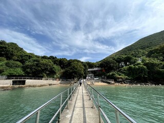 There are plenty of relatively uninhabited islands all around Hong Kong, but none closer than Tung...