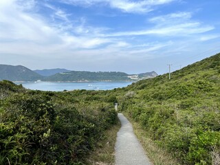 There are plenty of relatively uninhabited islands all around Hong Kong, but none closer than Tung...