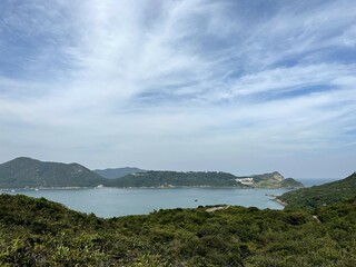 There are plenty of relatively uninhabited islands all around Hong Kong, but none closer than Tung...