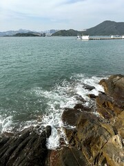 There are plenty of relatively uninhabited islands all around Hong Kong, but none closer than Tung...