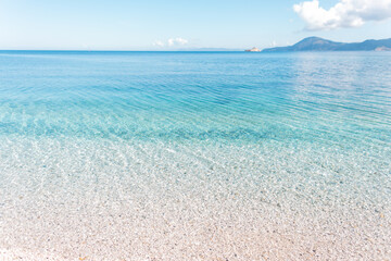 Amazing clear azure sea with beach, clear water and beautiful sky in Elba island, Italy