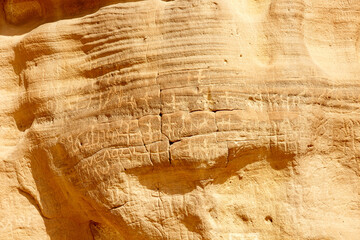 Rocks with carved letters on them